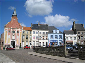 View from the shop into the main square of Ardres